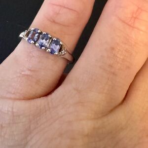 Oval Tanzanite w/ White Diamond Accent Rhodium over Sterling Silver. Sz 7.